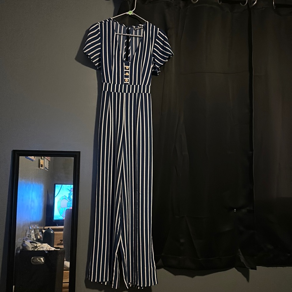 Blue and white jumpsuit. Size 9